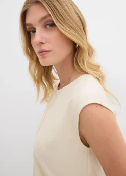 Top à base élastiquée