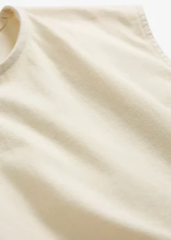 Top à base élastiquée