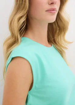 Top à base élastiquée