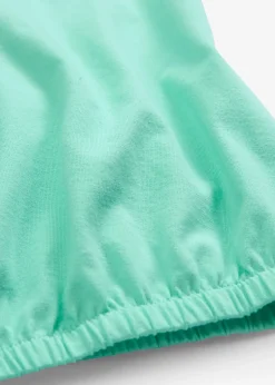 Top à base élastiquée