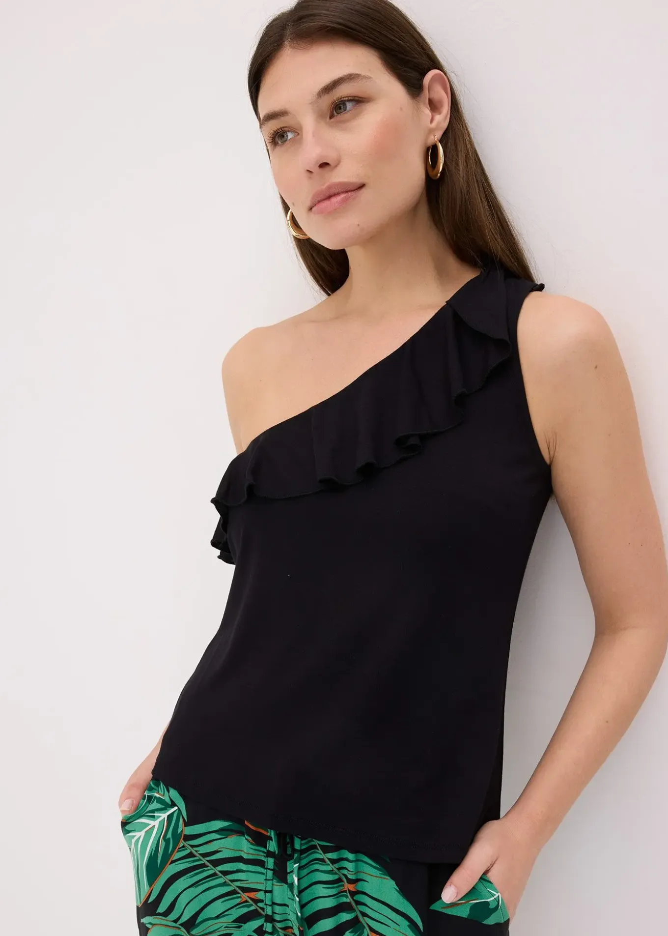 Top asymétrique avec volant en viscose douce et extensible