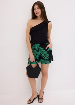 Top asymétrique avec volant en viscose douce et extensible