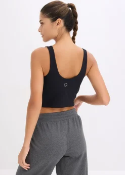 Top de sport avec soutien-gorge intégré, maintien modéré et toucher coton