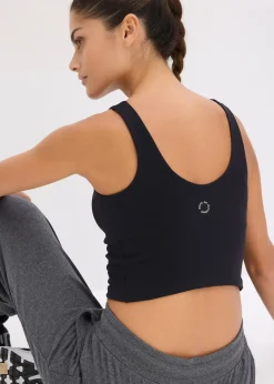 Top de sport avec soutien-gorge intégré, maintien modéré et toucher coton