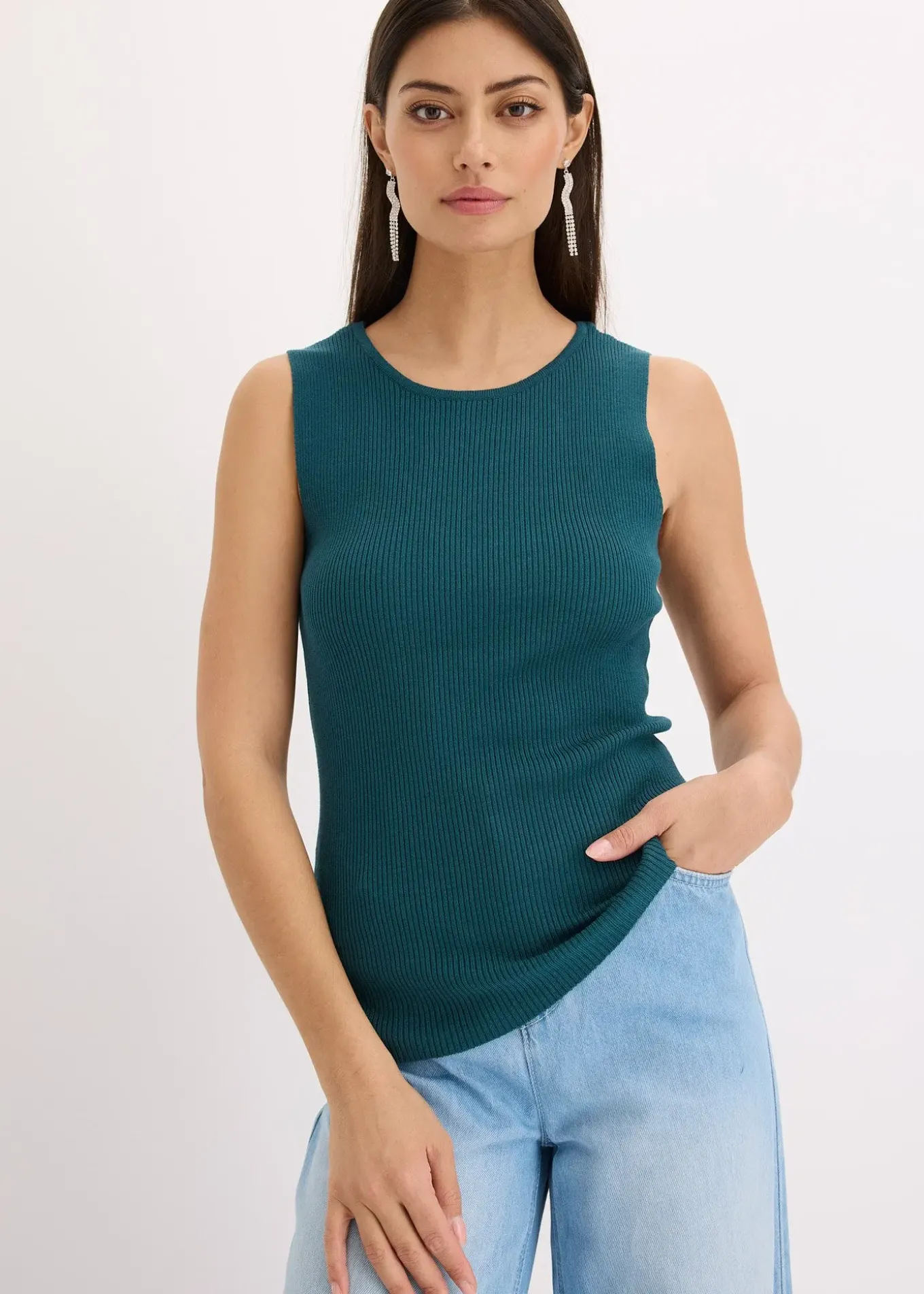 Top en maille avec un lien brillant