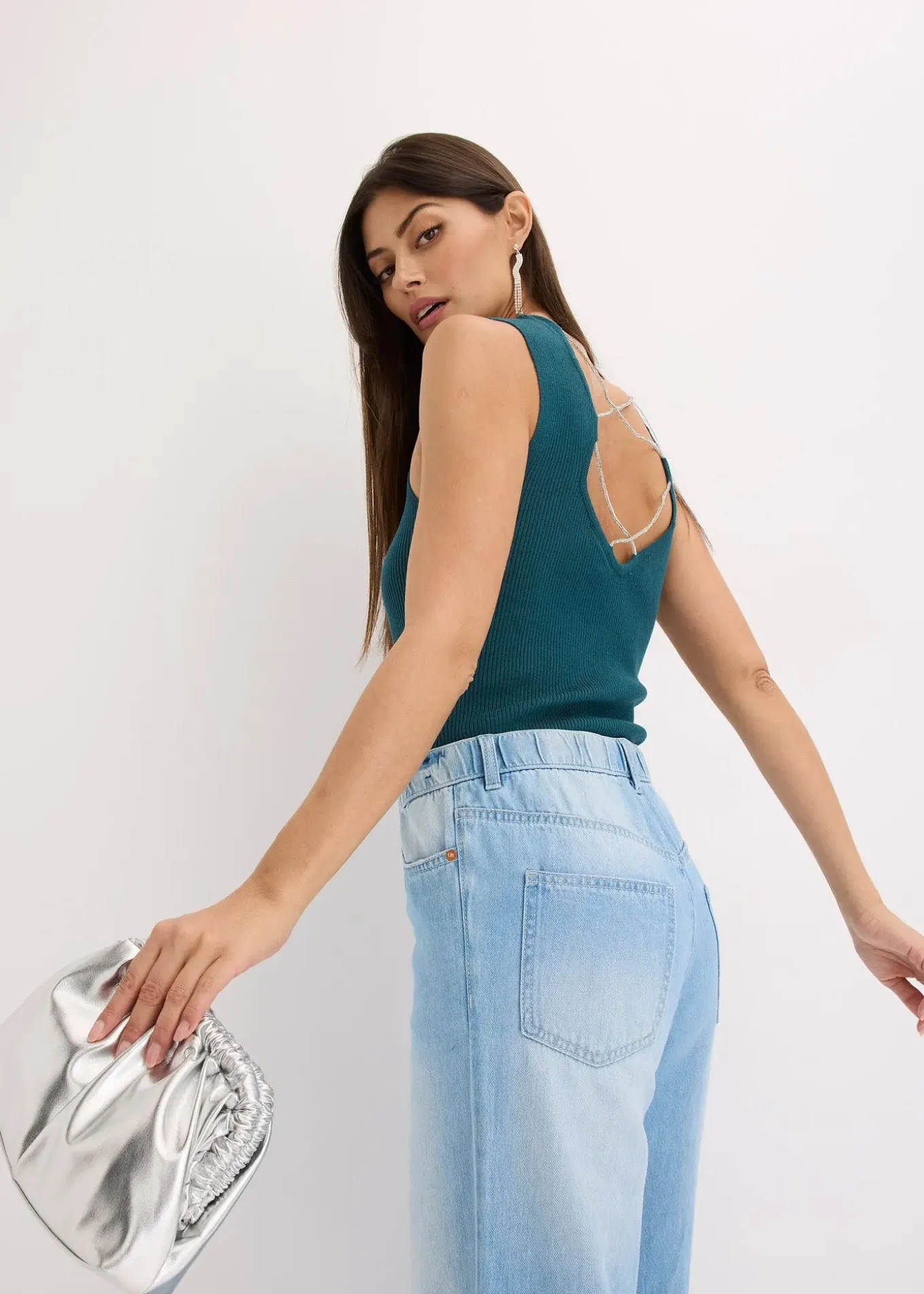 Top en maille avec un lien brillant