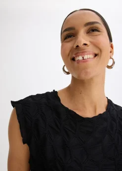 Top en matière texturée