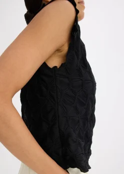 Top en matière texturée