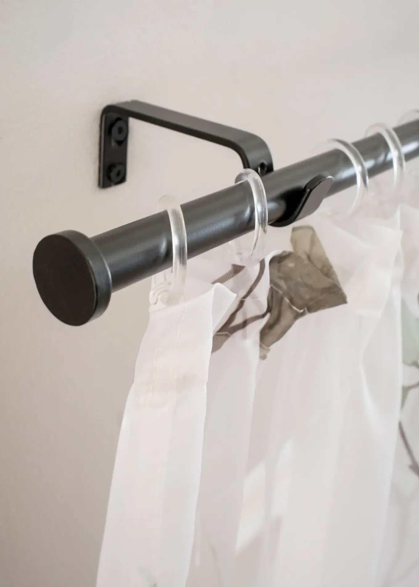 Tringle à rideau embout rondelle