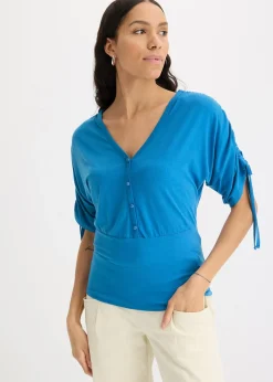 T-shirt à boutons décoratifs