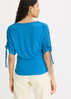 T-shirt à boutons décoratifs