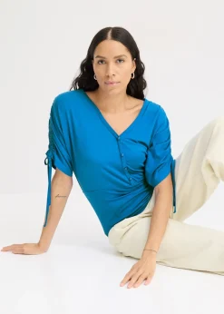 T-shirt à boutons décoratifs