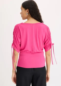 T-shirt à boutons décoratifs