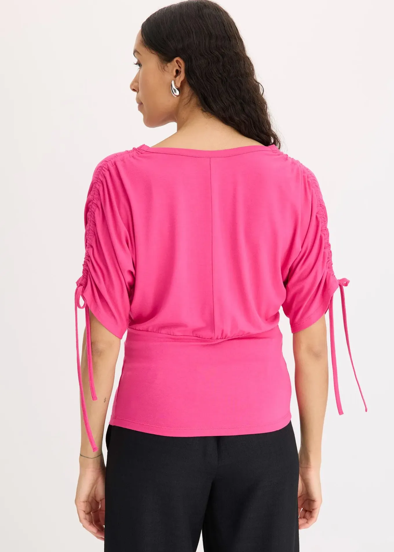 T-shirt à boutons décoratifs