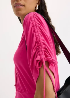 T-shirt à boutons décoratifs