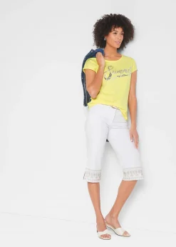 T-shirt avec inscription à sequins