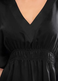 Tunique de plage transparente à col V