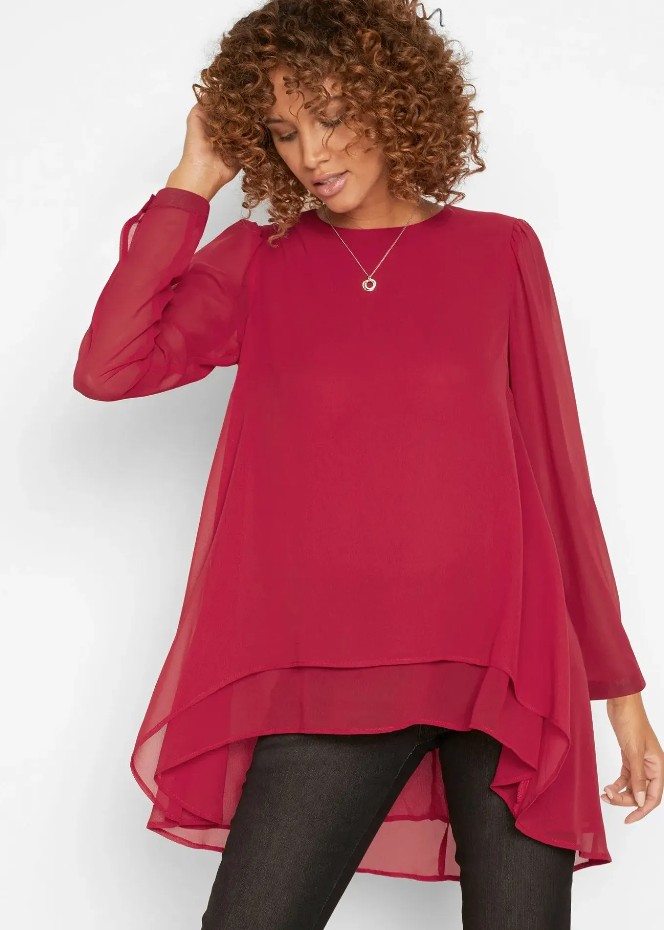 Tunique plus longue derrière