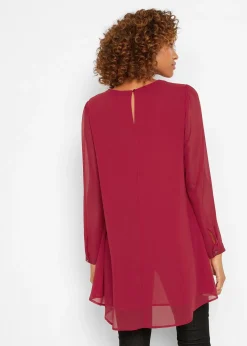 Tunique plus longue derrière