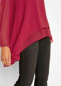 Tunique plus longue derrière