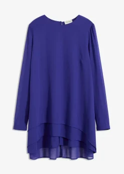 Tunique plus longue derrière