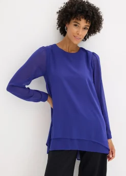 Tunique plus longue derrière