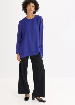 Tunique plus longue derrière