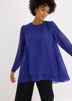 Tunique plus longue derrière