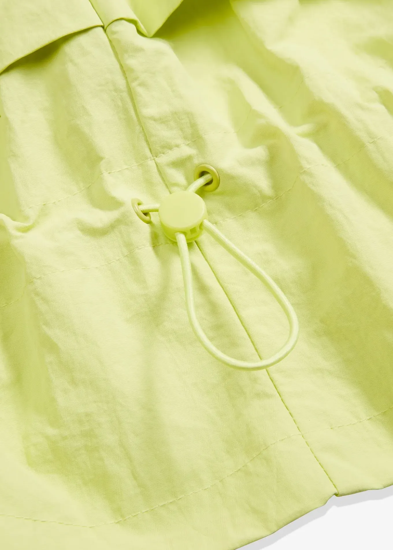 Veste courte à taille resserrable