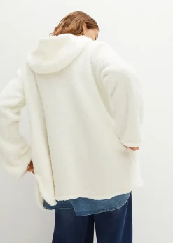 Veste en sherpa coupe trapèze avec fentes latérales