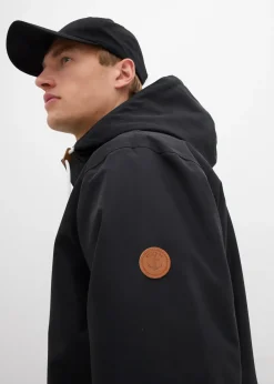 Veste imperméable à capuche et détails enduits